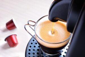 espresso machine top view and cup of coffee