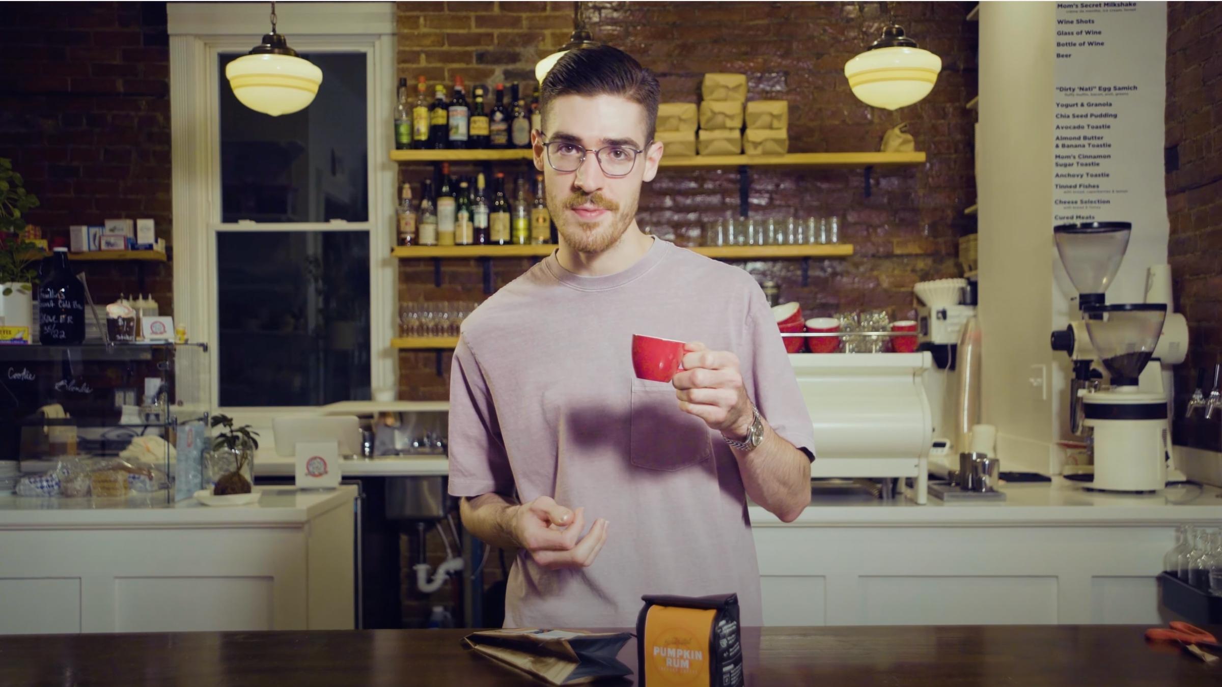 barista tastes brewed Fire Dept. Coffee