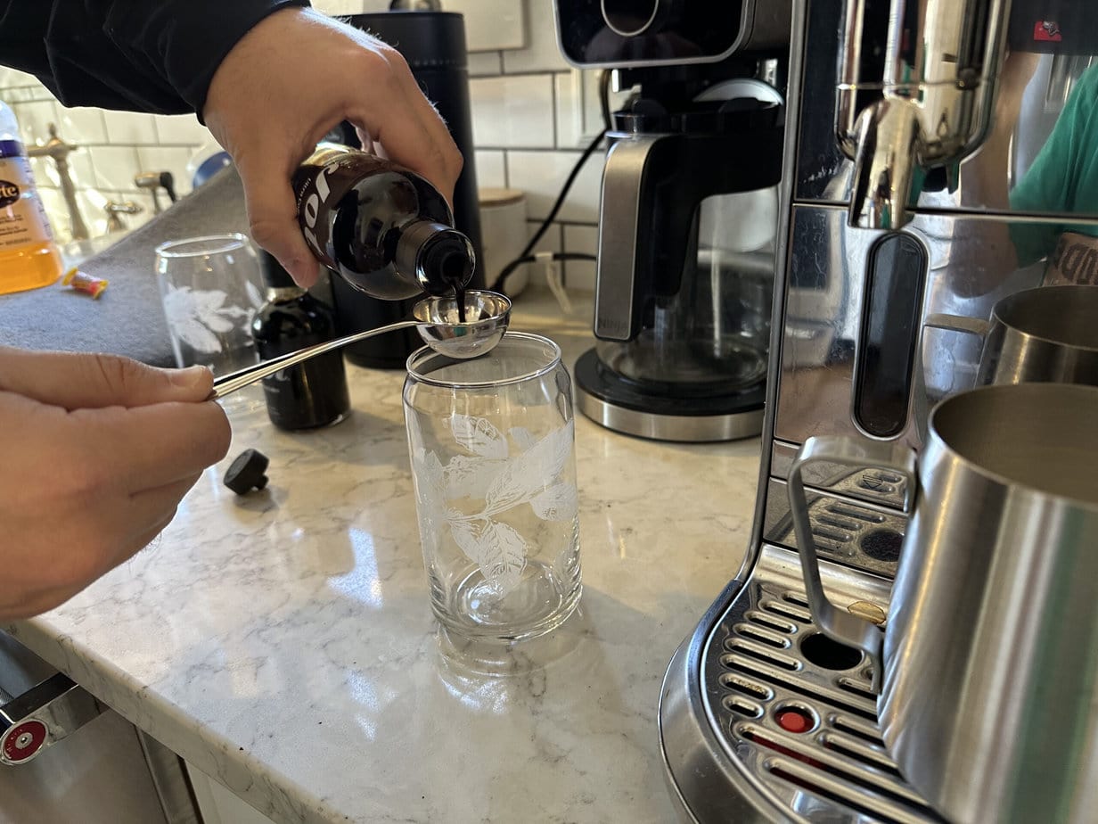 Jot Ultra Coffee is poured into a measuring spoon