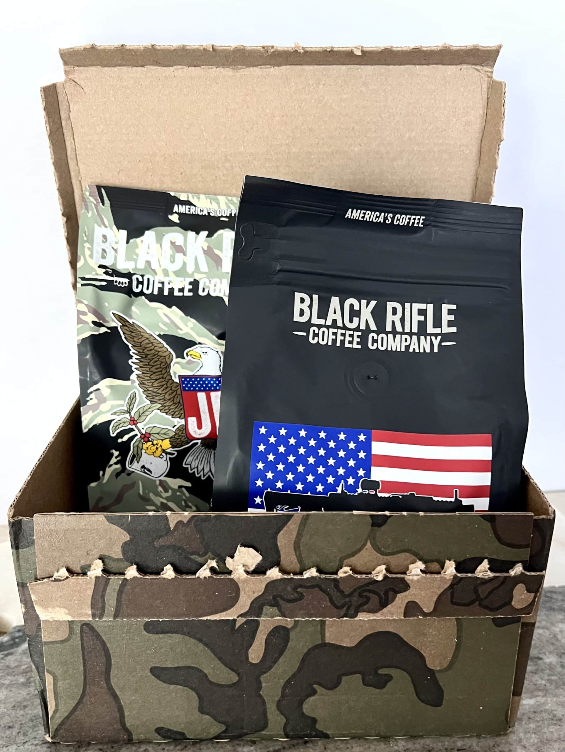 Two different packs of Black Rifle Coffee in an open shipping box